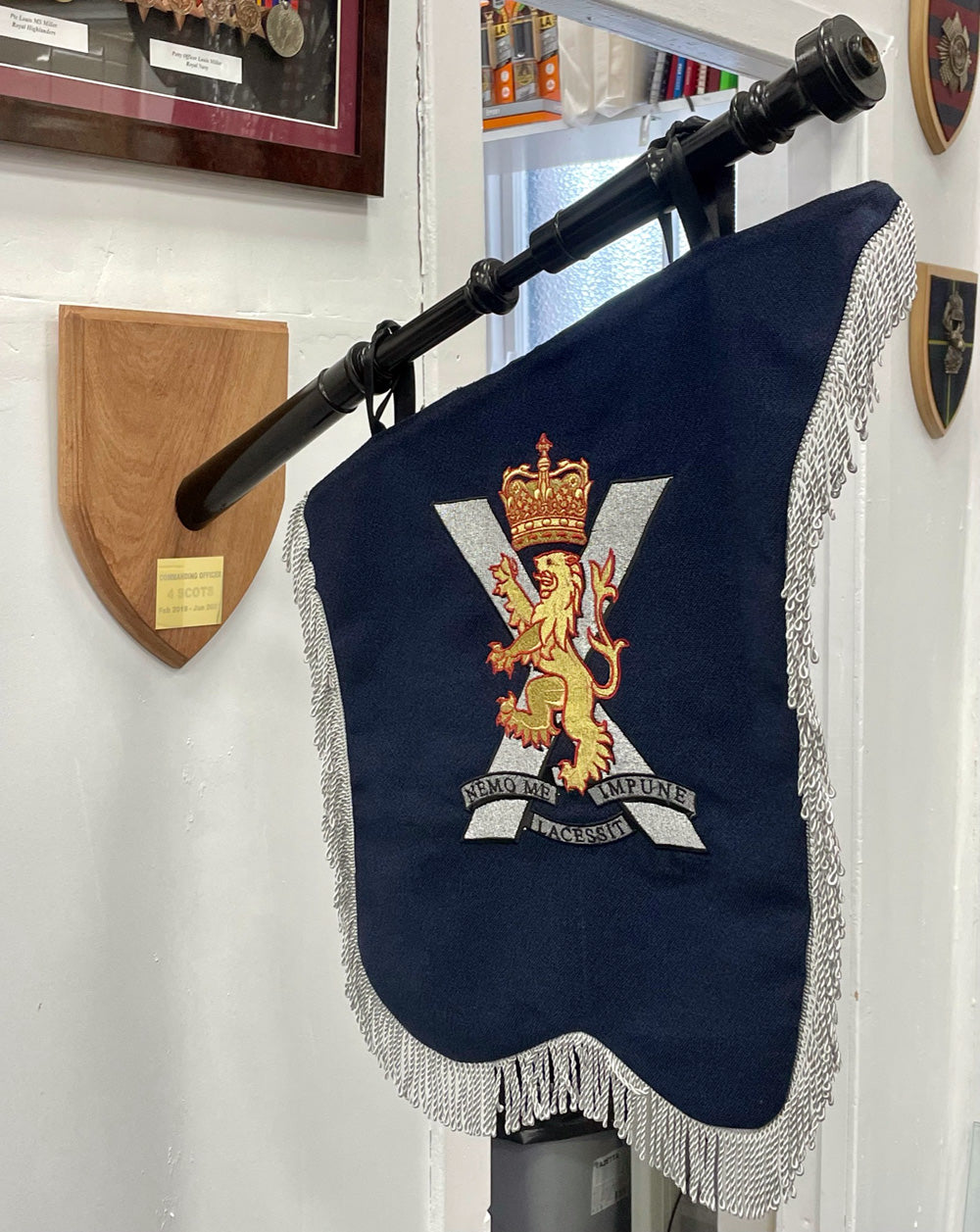 Bag pipe banner wall mounted display.