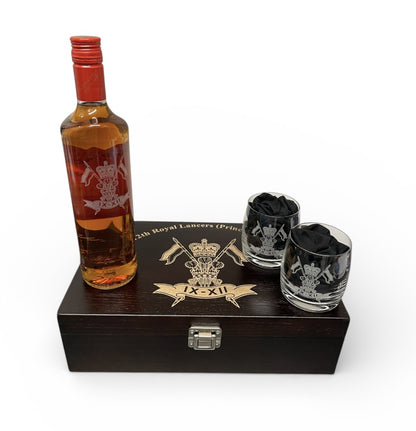 Bottle of whiskey with two glasses on a wooden box with a logo